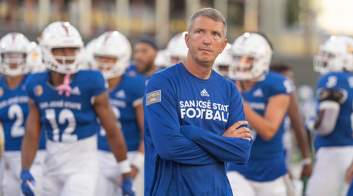 San Jose State Spartans coach Brent Brennan watches warmups before the start of the first quarter against Portland State Vikings at CEFCU Stadium.